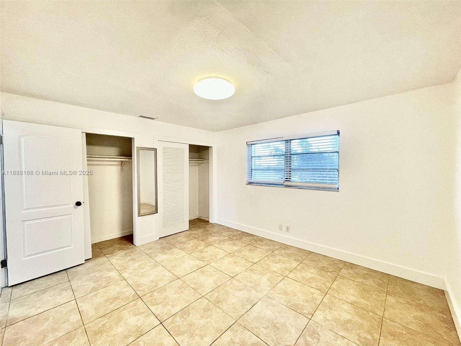2255 Southeast 5th Street, Unit 10 Pompano Beach, FL 33062 - Photo 2 of 10 a view of an empty room