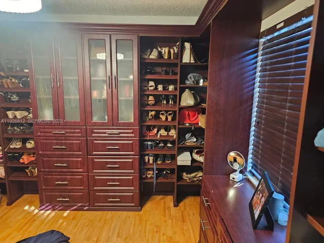 a front view of a house with outdoor seating