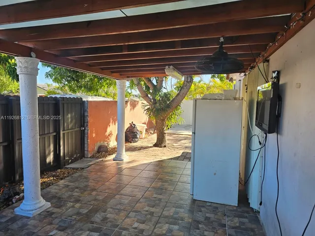 a view of a bench in a yard
