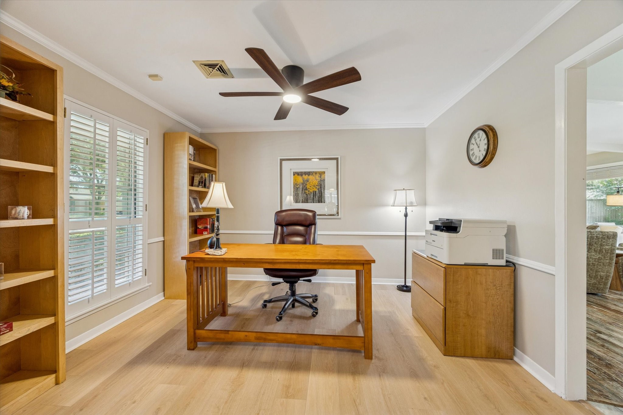 10902 Mullins Drive Houston, TX 77096 - Photo 5 of 20 a workspace with furniture and window