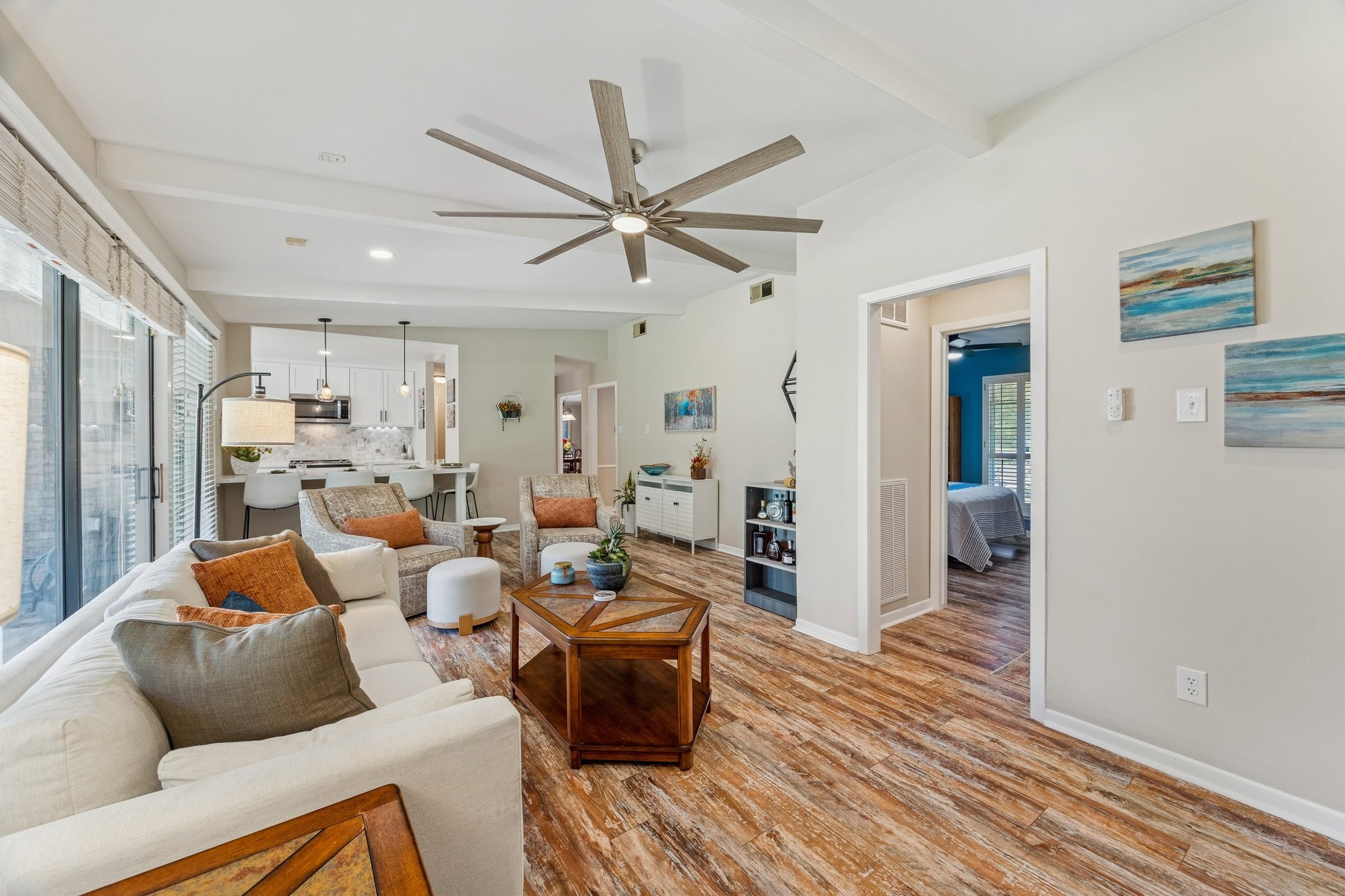10902 Mullins Drive Houston, TX 77096 - Photo 7 of 20 a living room with furniture and a wooden floor