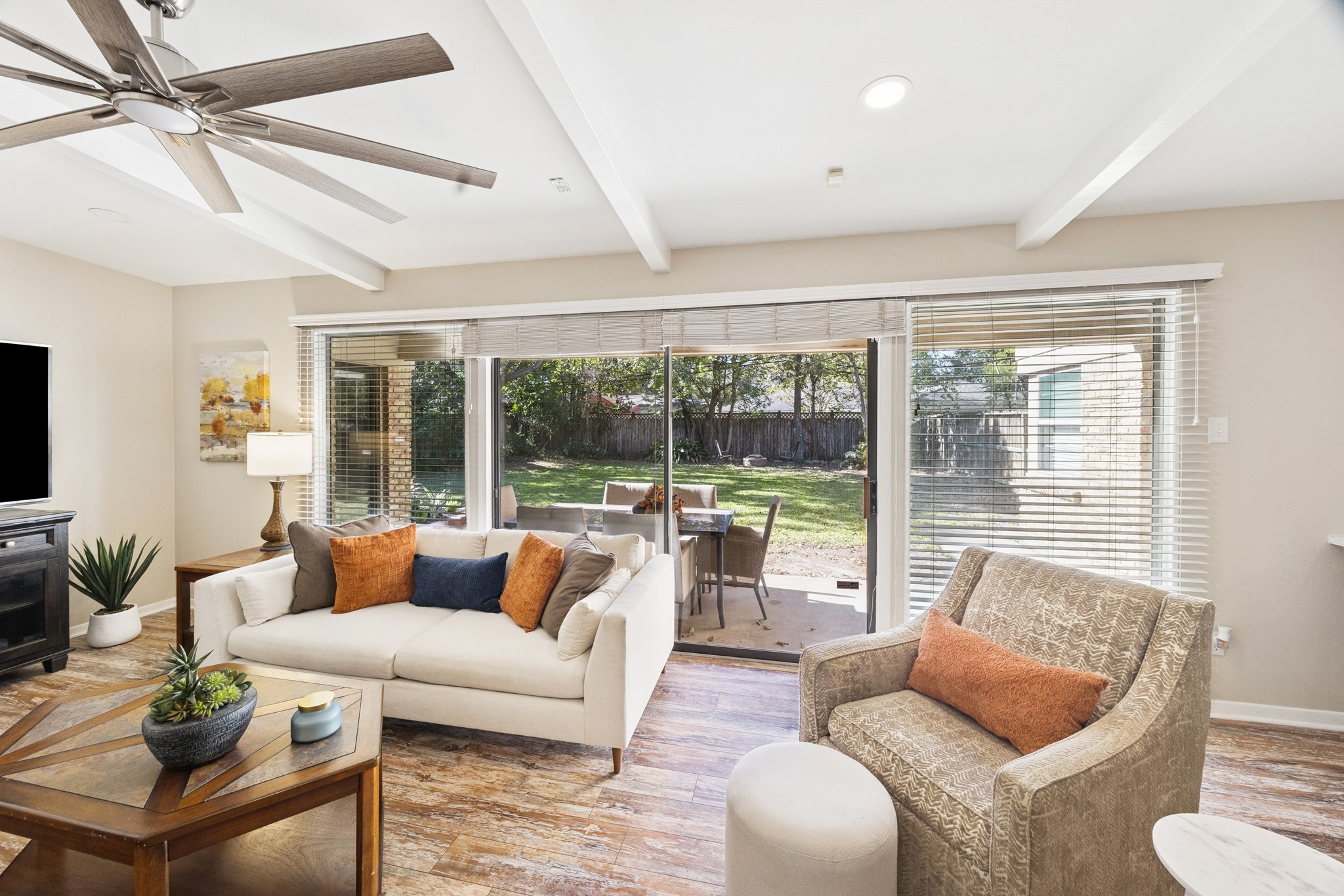 10902 Mullins Drive Houston, TX 77096 - Photo 8 of 20 a living room with furniture and a large window