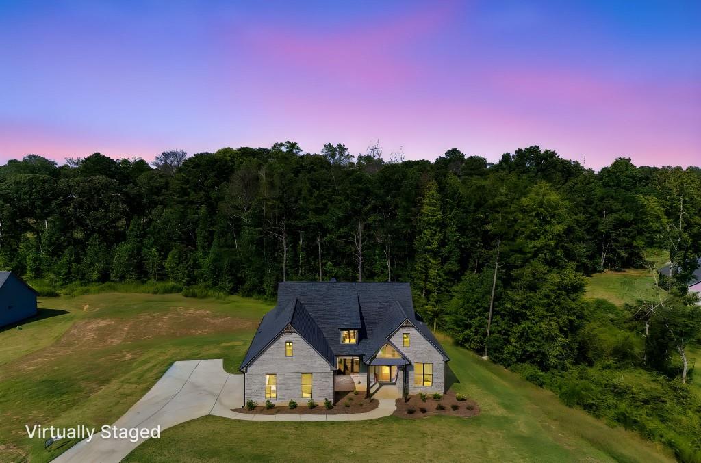 62 Ridgewood Creek Path Dallas, GA 30157 - Photo 2 of 31 a view of a tiny house with a yard