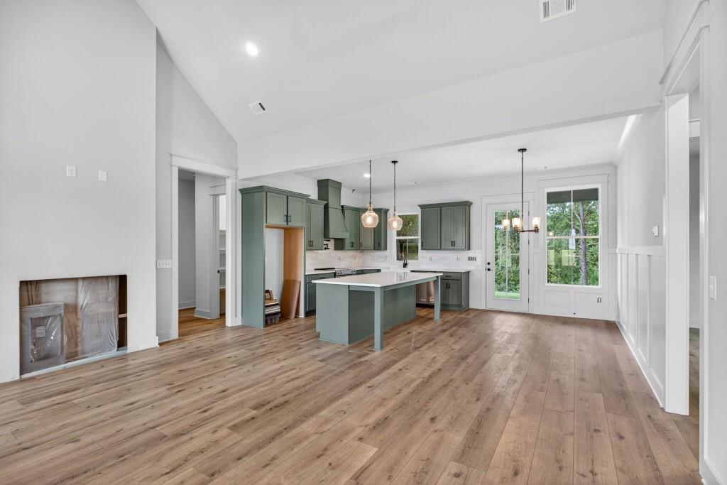 62 Ridgewood Creek Path Dallas, GA 30157 - Photo 28 of 31 a large kitchen with a wooden floor and a view of kitchen