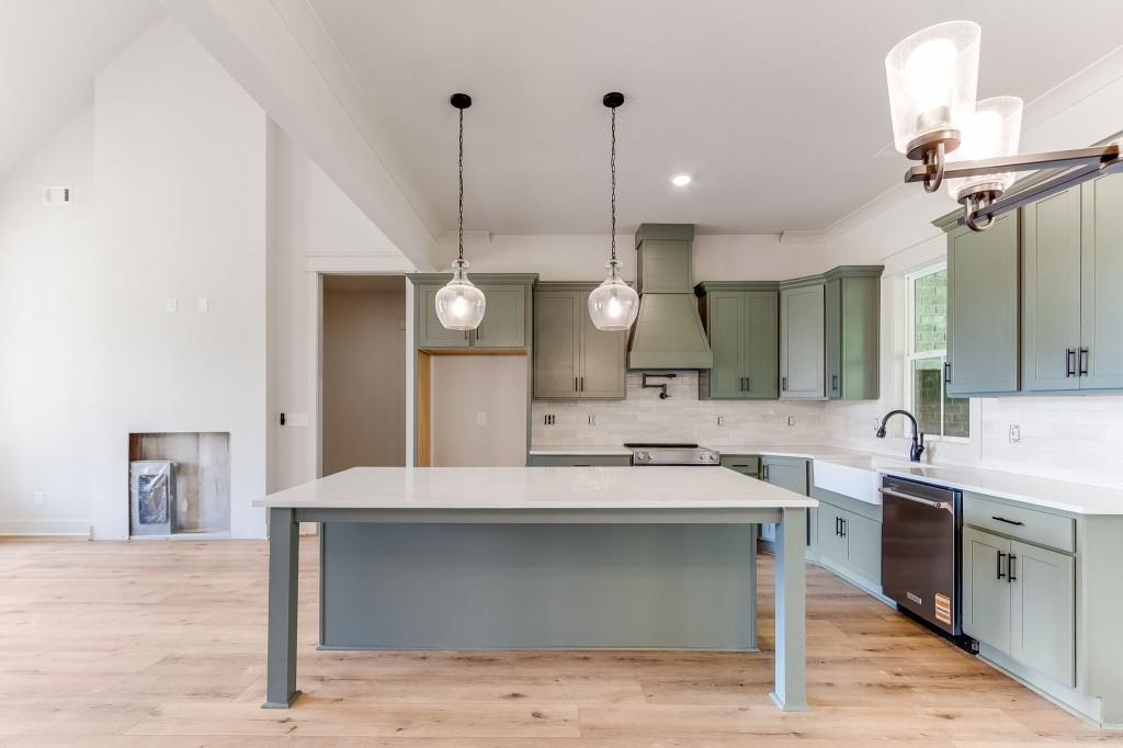 62 Ridgewood Creek Path Dallas, GA 30157 - Photo 29 of 31 a large kitchen with a lot of counter space and a sink