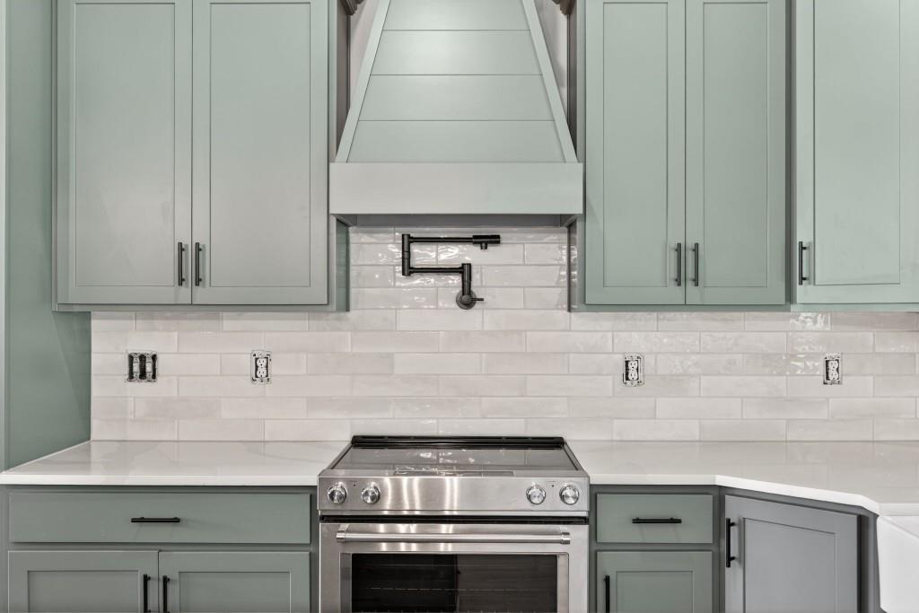 62 Ridgewood Creek Path Dallas, GA 30157 - Photo 30 of 31 a kitchen with a sink stove and cabinets