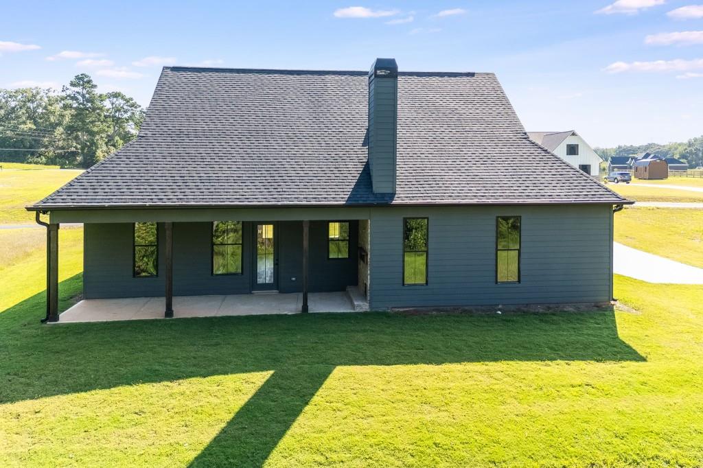 62 Ridgewood Creek Path Dallas, GA 30157 - Photo 4 of 31 a view of a house with a swimming pool