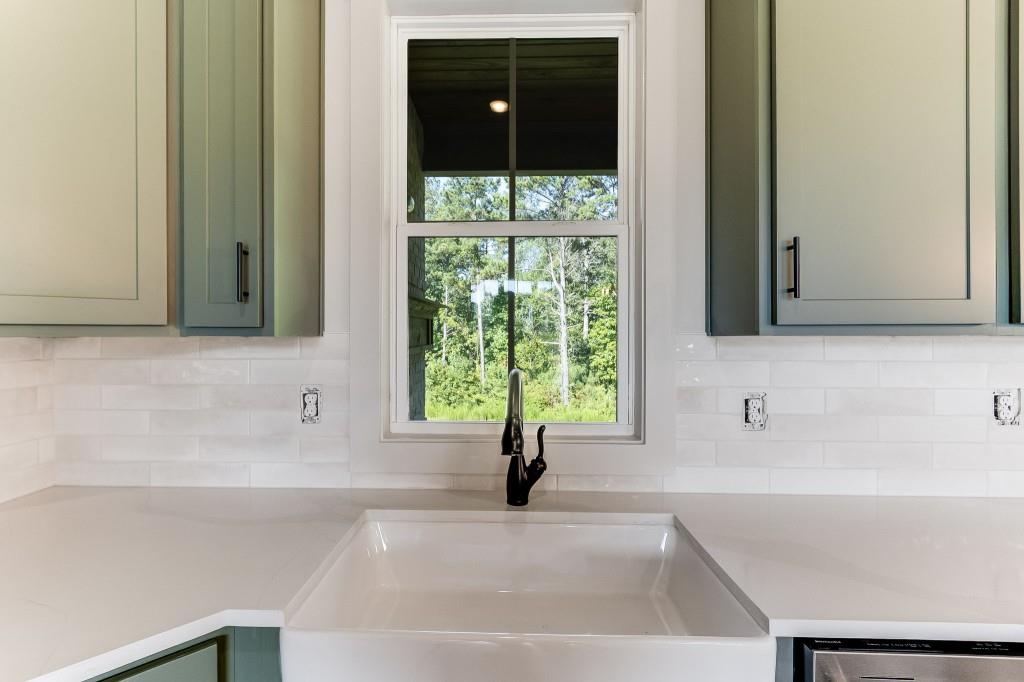 62 Ridgewood Creek Path Dallas, GA 30157 - Photo 6 of 31 a bathroom with a bathtub and a sink