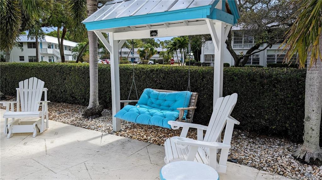 Undisclosed Address Stuart, FL 34996 - Photo 13 of 28 a view of backyard with outdoor seating and plants