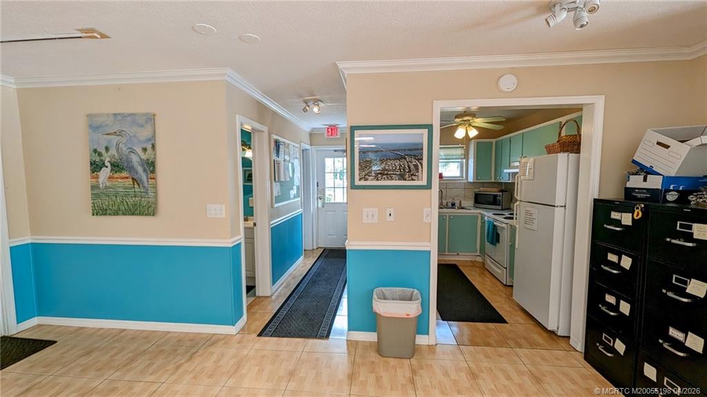 Undisclosed Address Stuart, FL 34996 - Photo 21 of 28 a kitchen with stainless steel appliances granite countertop a refrigerator and a sink