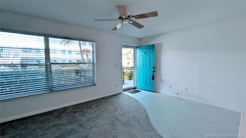 Undisclosed Address Stuart, FL 34996 - Photo 5 of 28 a view of an empty room with a window