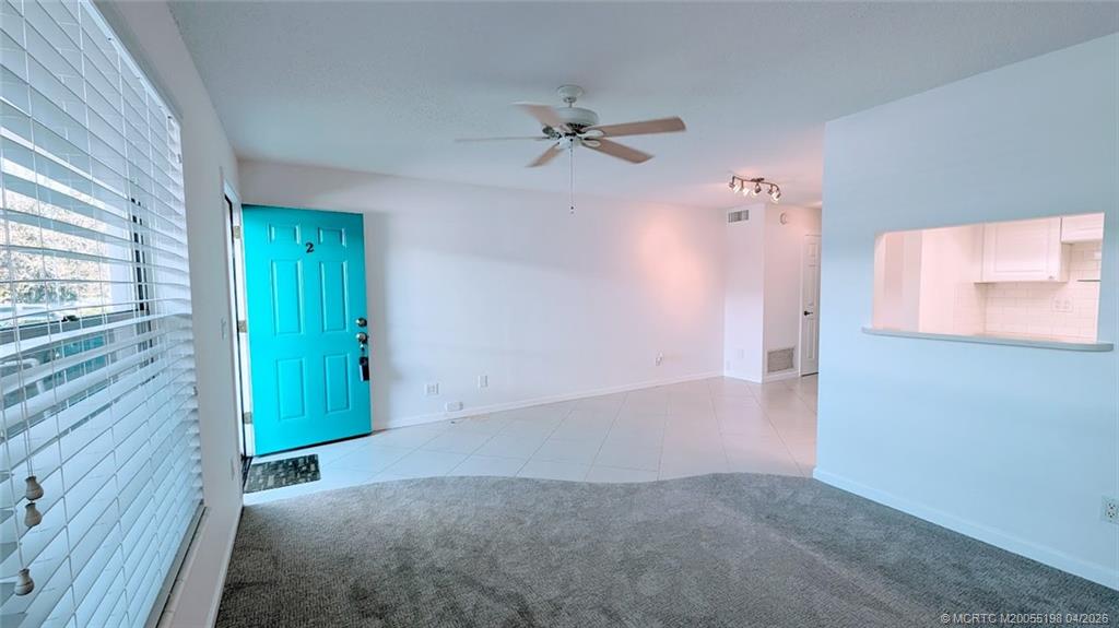 Undisclosed Address Stuart, FL 34996 - Photo 7 of 28 an empty room with windows and closet