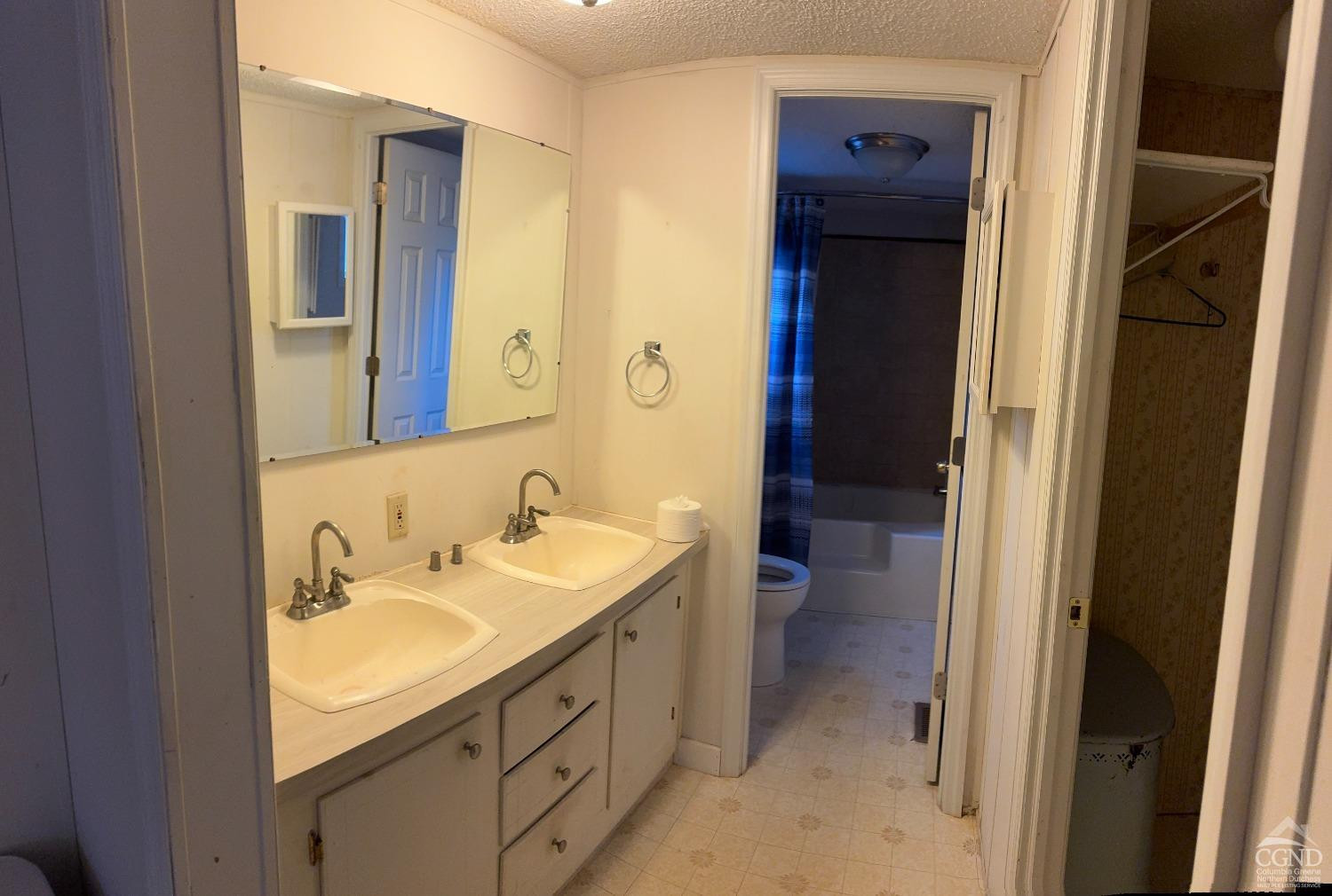1406 Rte 31 Germantown, NY 12526 - Photo 14 of 25 a bathroom with a sink a toilet and shower