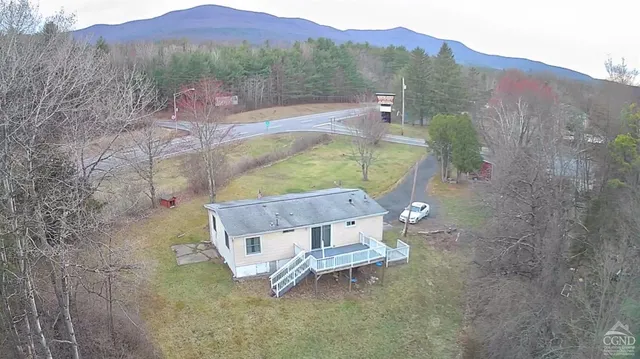a view of a terrace with a yard