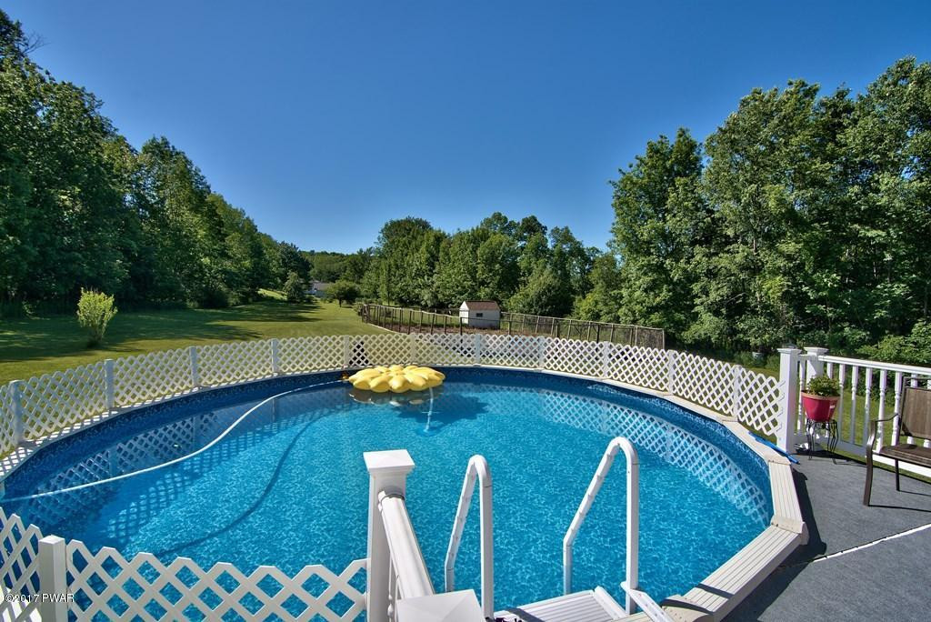 145 Keystone Road Lake Ariel, PA 18436 - Photo 38 of 52 a view of a swimming pool with a patio