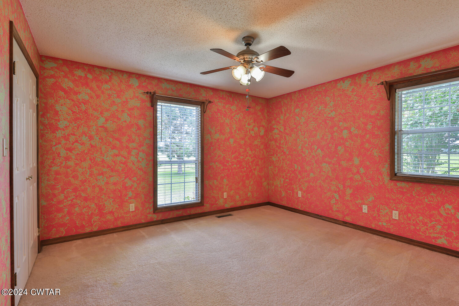 826 Old Salem Road Martin, TN 38237 - Photo 38 of 43 an empty room with windows and fan