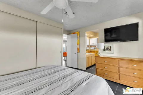 a kitchen with stainless steel appliances a stove a sink and a refrigerator