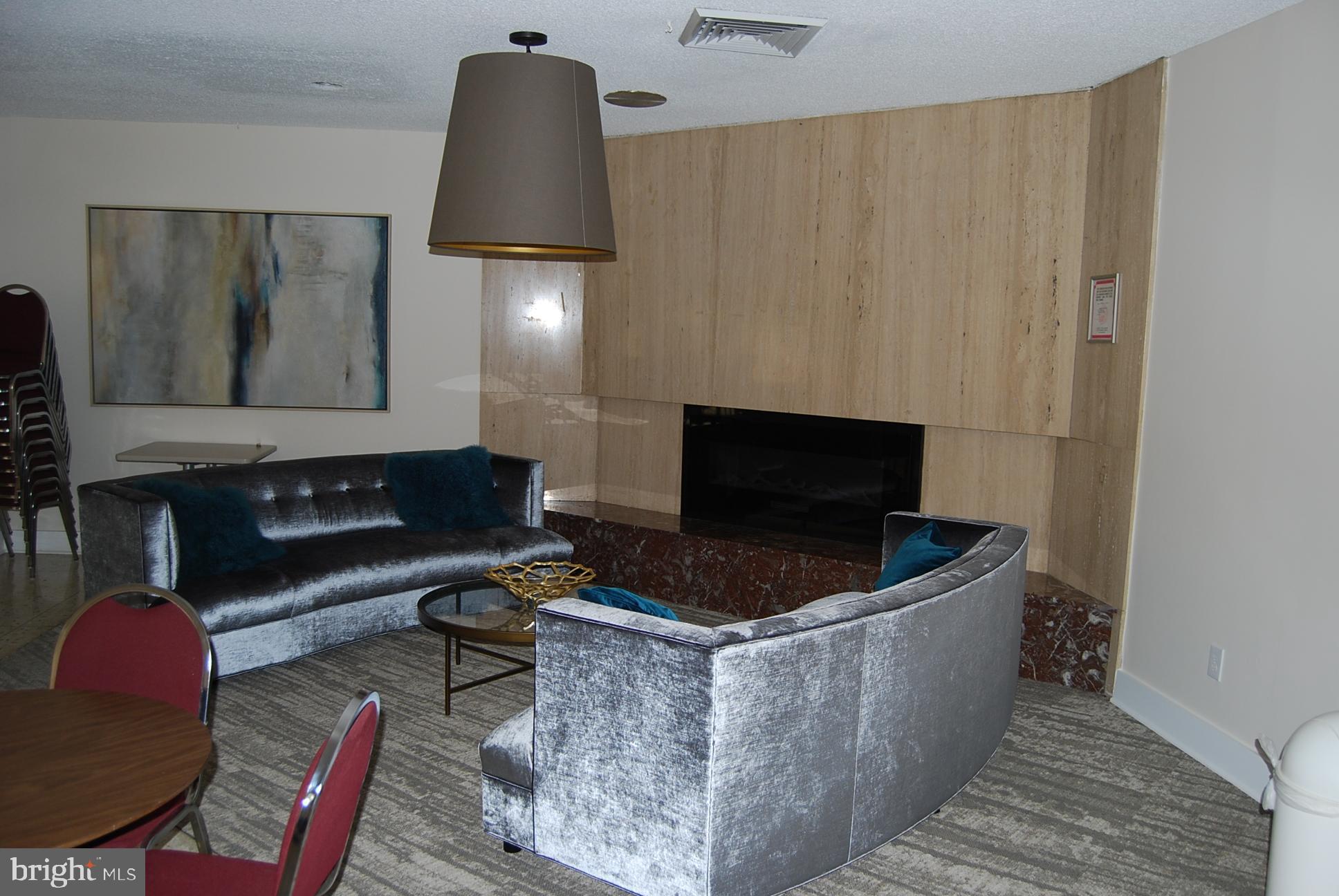 6101 Edsall Road, Unit 401 Alexandria, VA 22304 - Photo 22 of 32 Party Room Fireplace