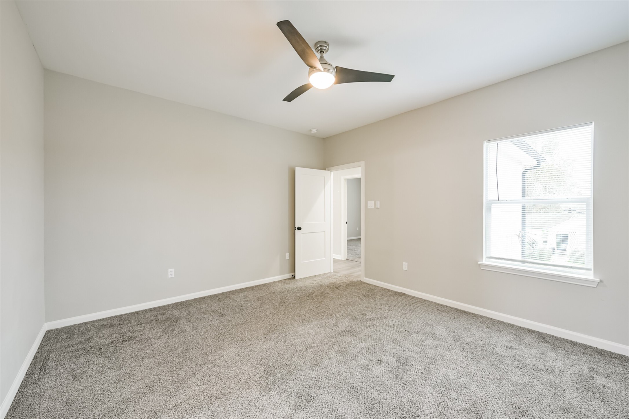4405 Mallow Street Houston, TX 77051 - Photo 4 of 5 an empty room with a window
