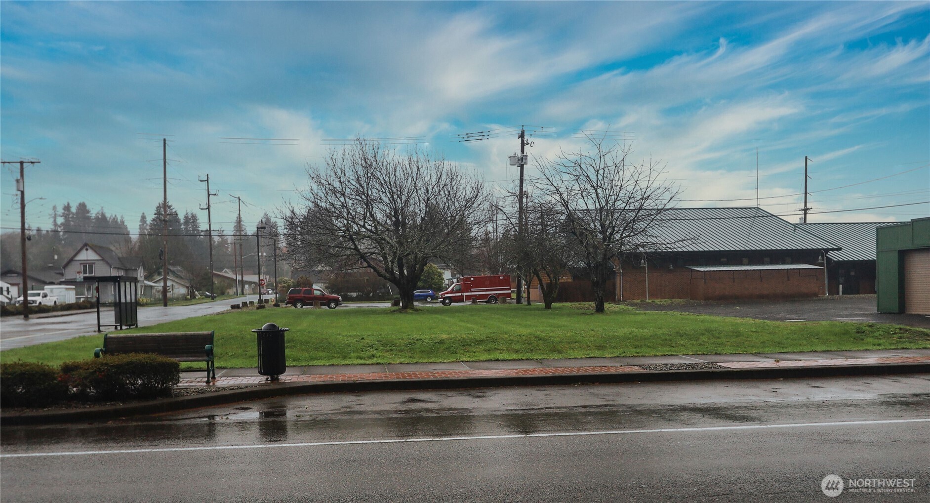 1312 1st Street Cosmopolis, WA 98537 - Photo 4 of 8 a backyard of a house with a yard and outdoor seating