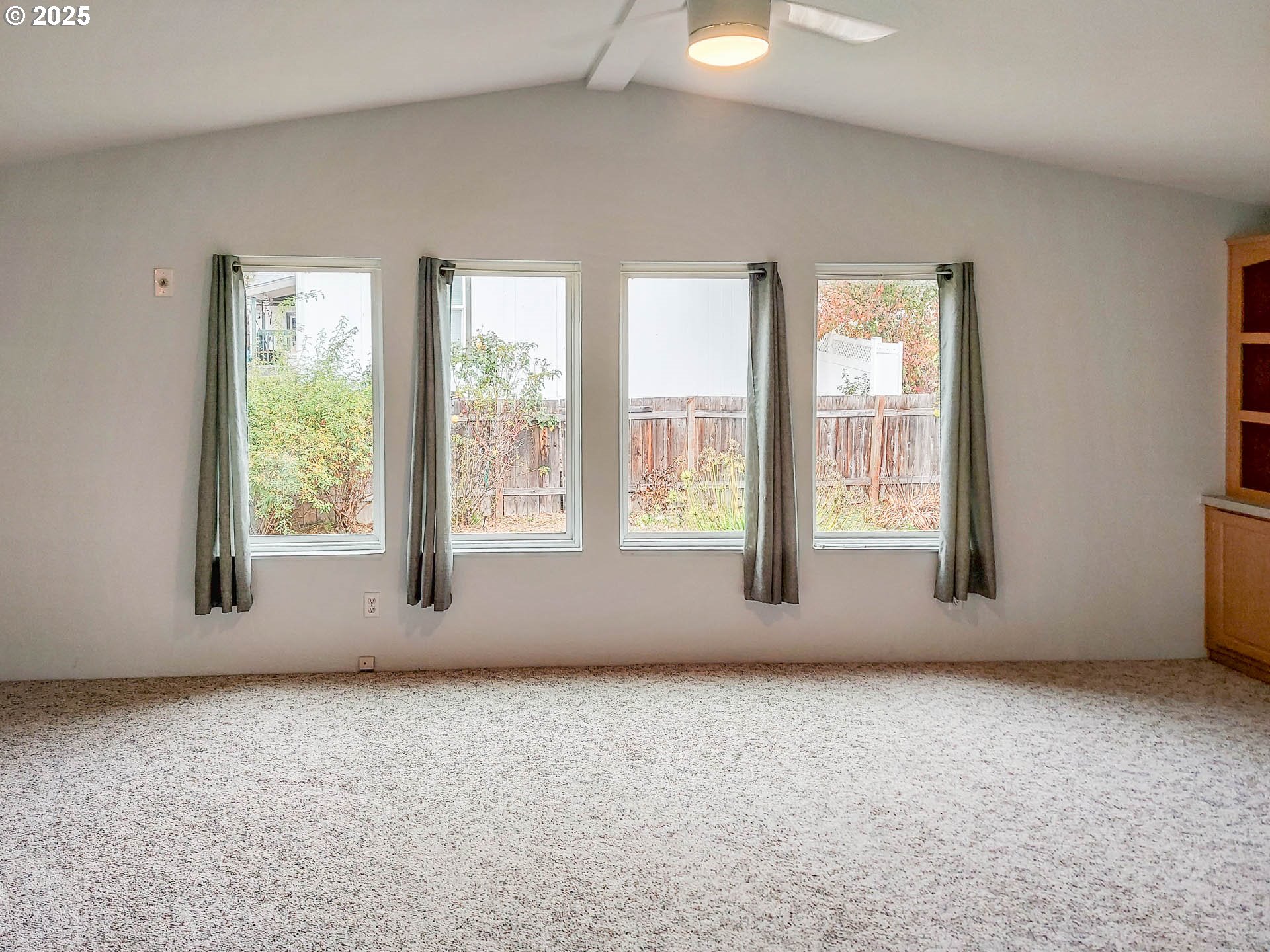 210 Northwest Timothy Avenue Winston, OR 97496 - Photo 11 of 38 a view of an empty room with a window