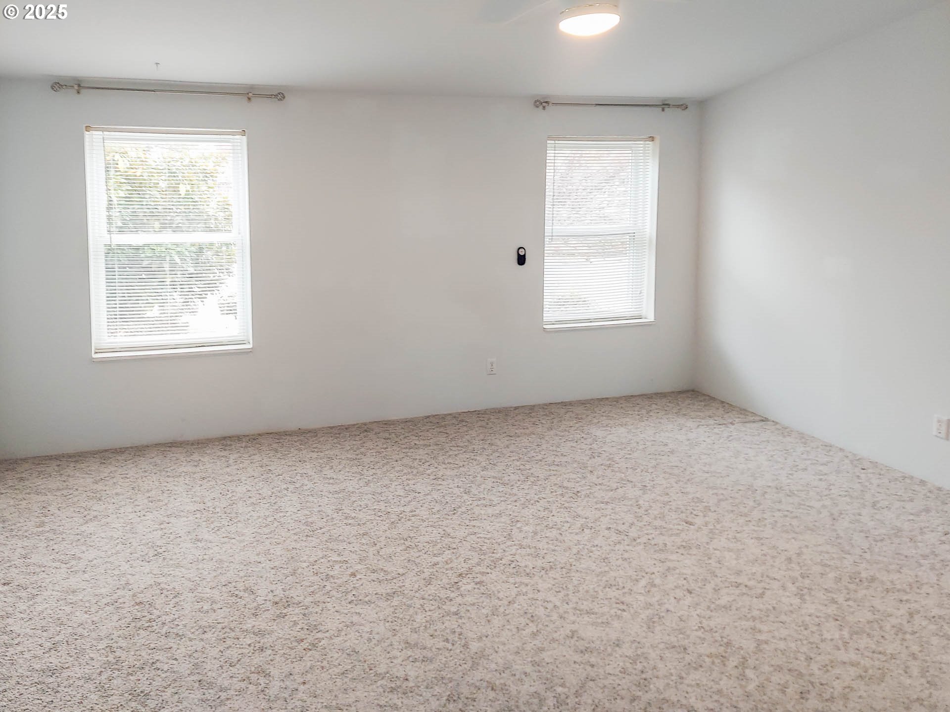 210 Northwest Timothy Avenue Winston, OR 97496 - Photo 13 of 38 an empty room with a window