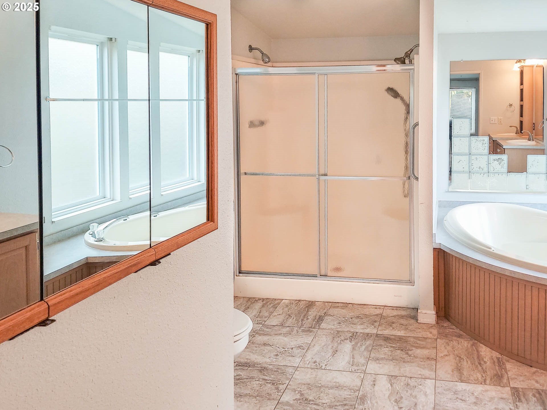210 Northwest Timothy Avenue Winston, OR 97496 - Photo 18 of 38 a bathroom with a tub and shower