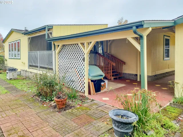 a view of a backyard of the house