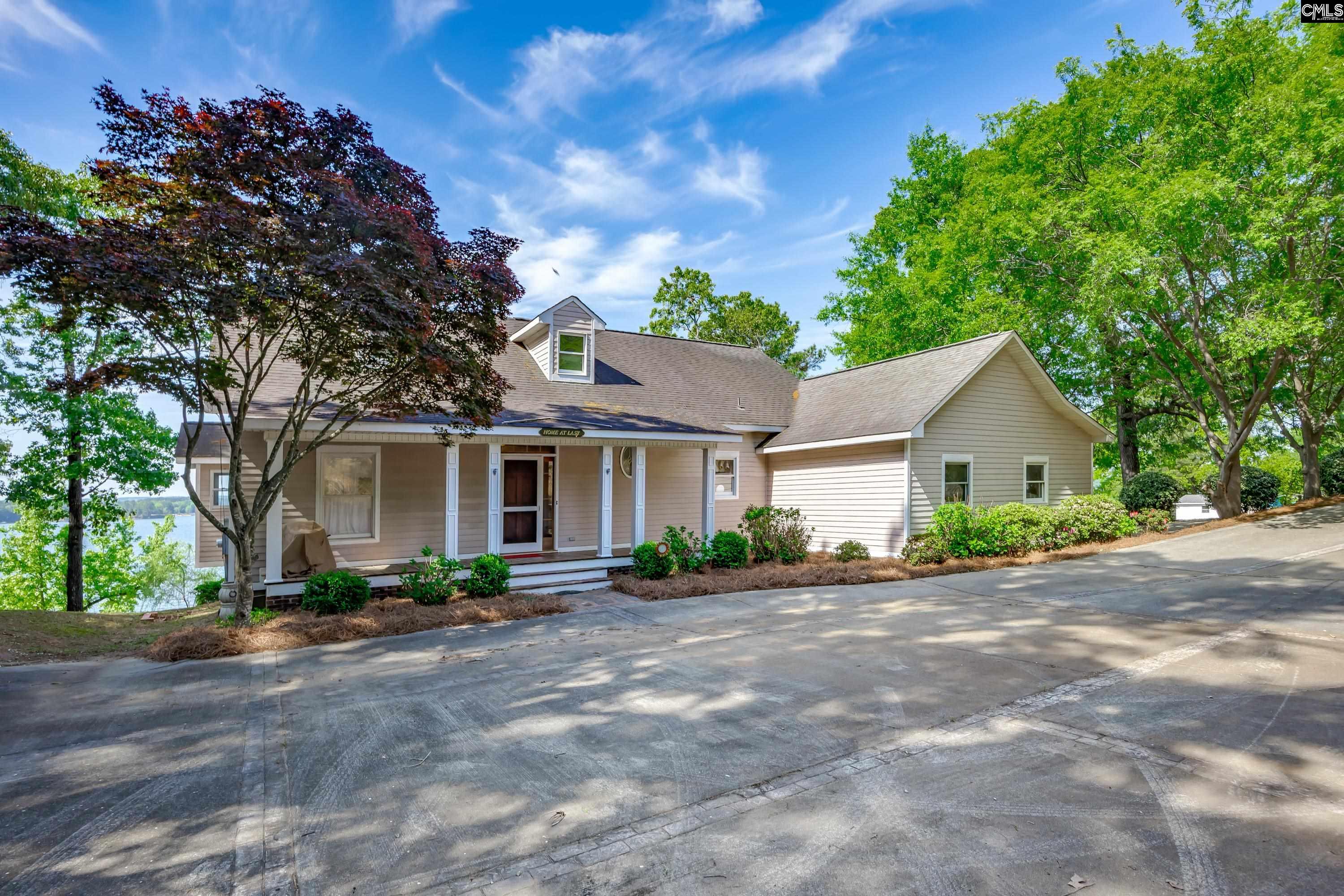 2577 Harbor View Road Camden, SC 29020 - Photo 1 of 42 front view of a house with a street