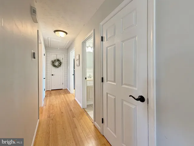 a room with furniture and wooden floor