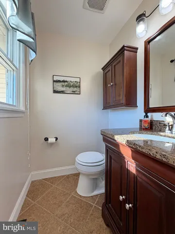 a view of livingroom with furniture and wooden floor