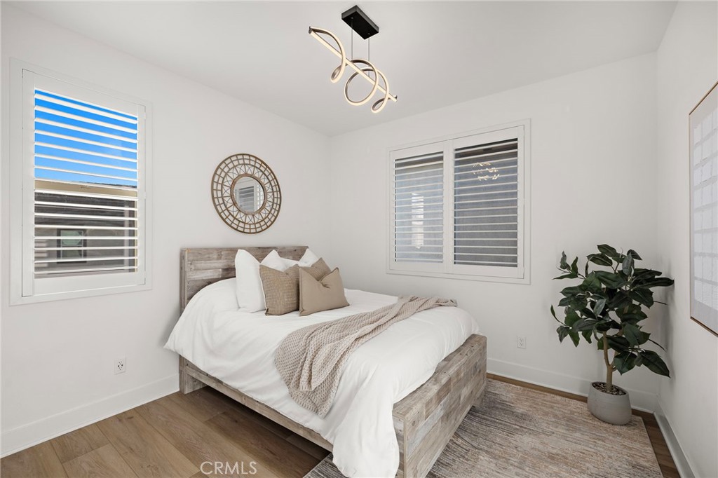 312 Merit Irvine, CA 92618 - Photo 25 of 46 a bedroom with bed and a window