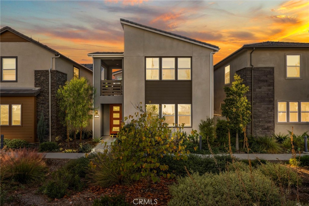 312 Merit Irvine, CA 92618 - Photo 32 of 46 a front view of a house with a yard