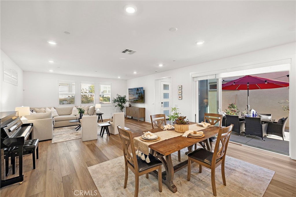 312 Merit Irvine, CA 92618 - Photo 9 of 46 a dining room with lots of tables a large window and chairs