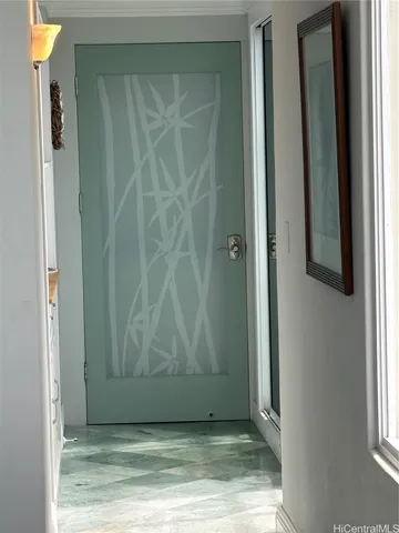 an empty room with wooden door
