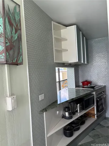 a room with storage and utility