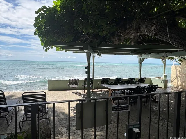 a view of balcony with chairs