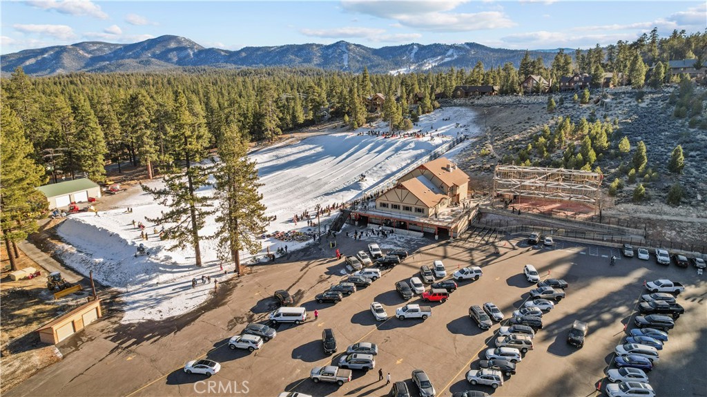 714 Paine Road Big Bear Lake, CA 92315 - Photo 18 of 39 a view of a lake with a mountain
