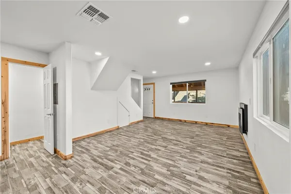 a living room with a fireplace