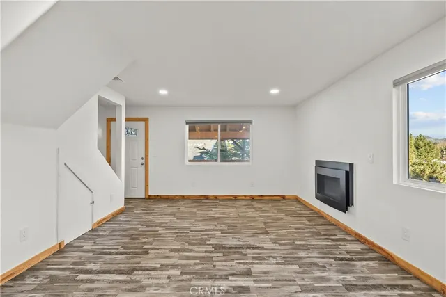 a bathroom with a sink vanity and mirror