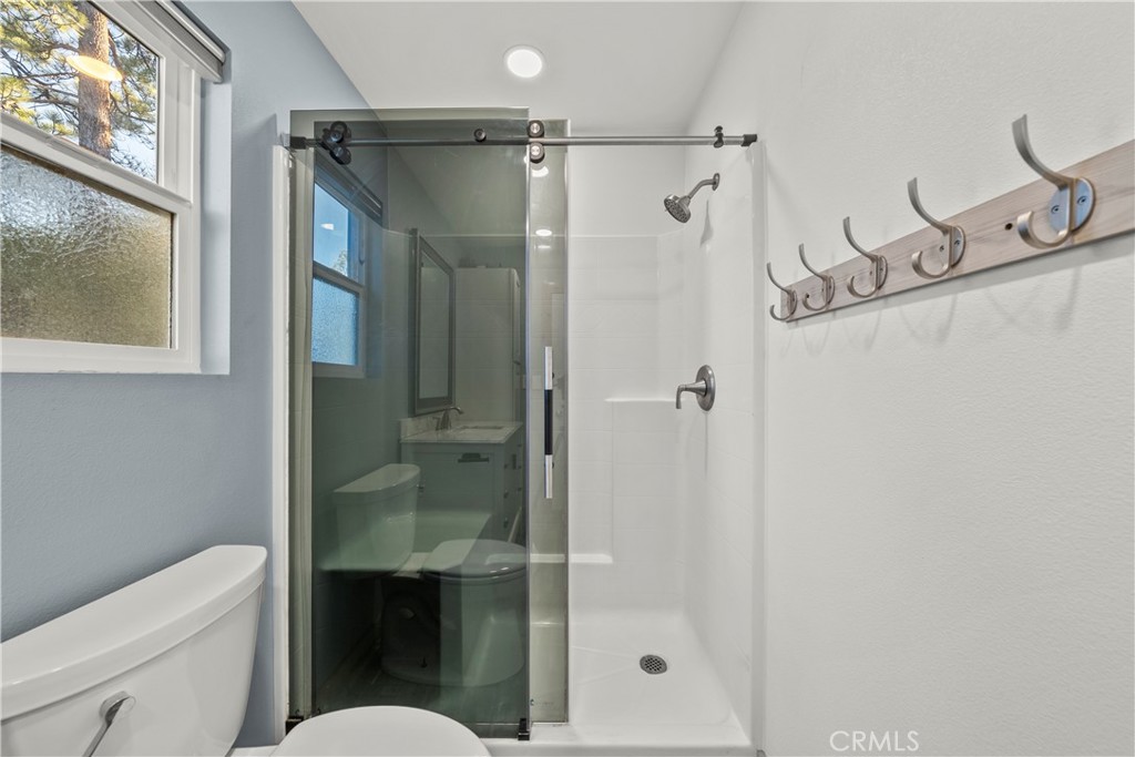 714 Paine Road Big Bear Lake, CA 92315 - Photo 34 of 39 a bathroom with a shower toilet and sink