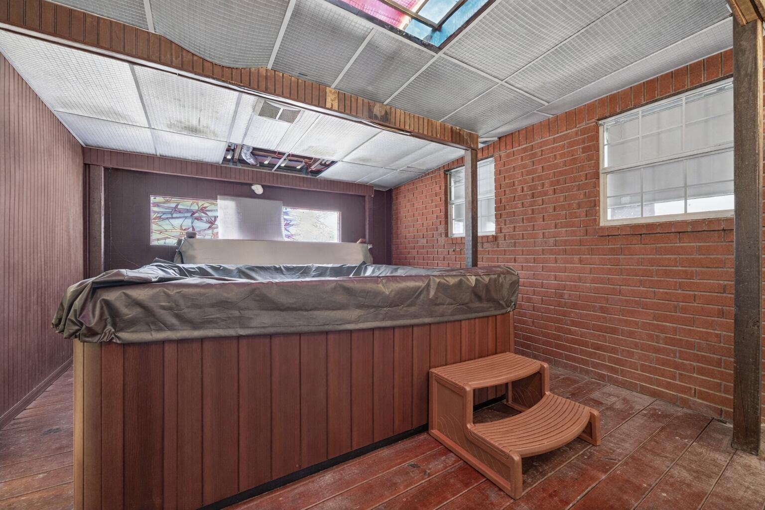 5688 Ridge Avenue Milton, FL 32583 - Photo 21 of 31 a bathroom with a granite countertop sink a toilet and mirror