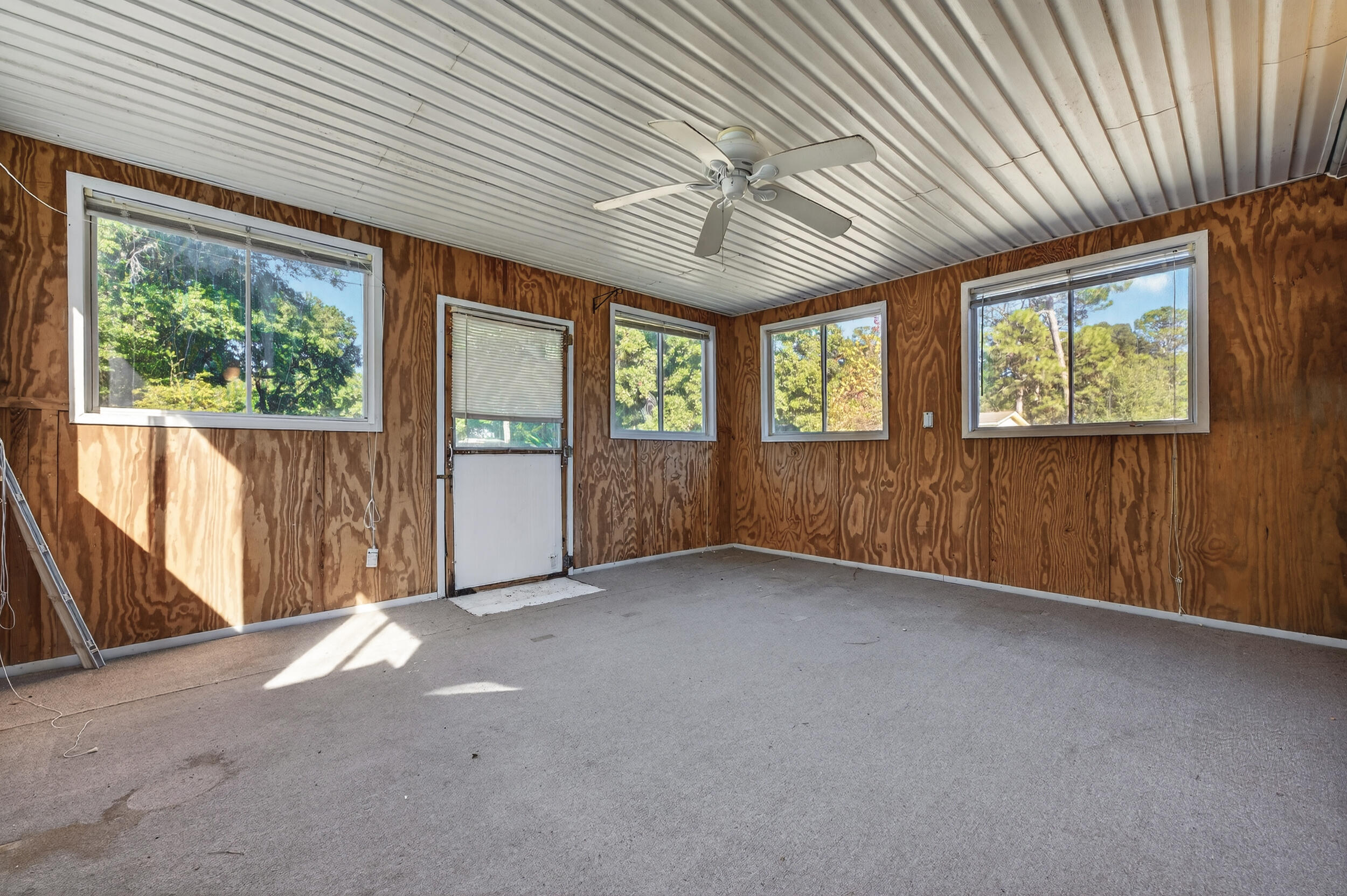 5688 Ridge Avenue Milton, FL 32583 - Photo 23 of 31 an empty room with windows