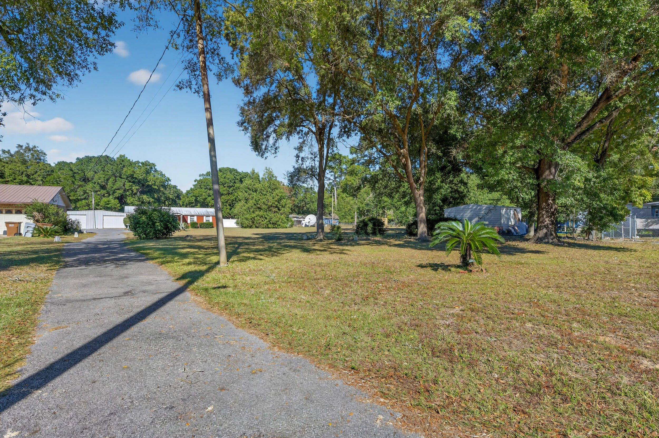 5688 Ridge Avenue Milton, FL 32583 - Photo 29 of 31 a view of a yard with swimming pool