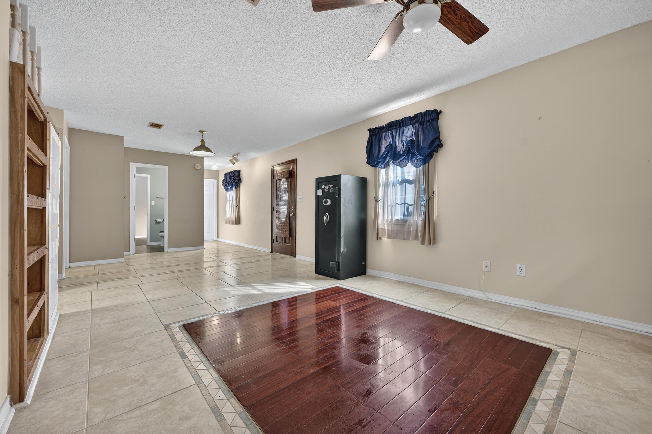 5688 Ridge Avenue Milton, FL 32583 - Photo 4 of 31 a view of an entryway with a chandelier