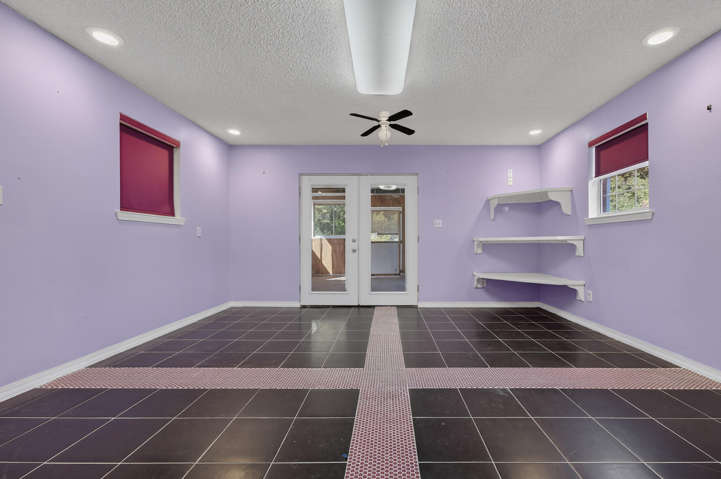 5688 Ridge Avenue Milton, FL 32583 - Photo 7 of 31 a view of an empty room with a window