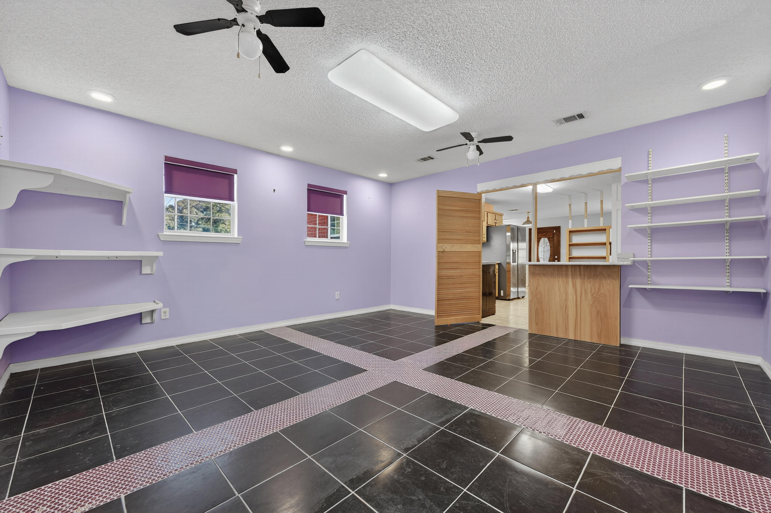 5688 Ridge Avenue Milton, FL 32583 - Photo 8 of 31 a view of an empty room with a window