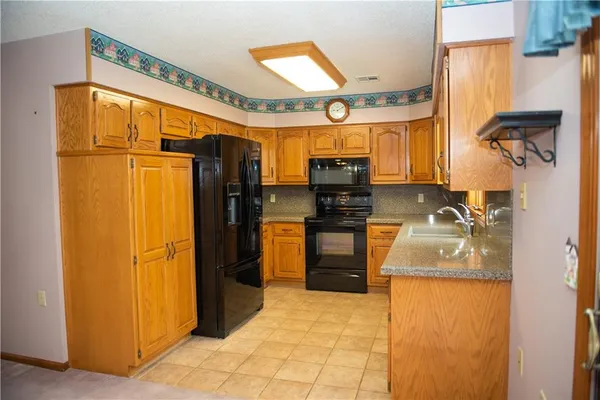 $315,000 | 19001 Sunrise Drive, Belton, MO 64012