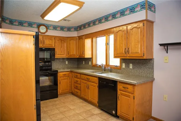 $315,000 | 19001 Sunrise Drive, Belton, MO 64012