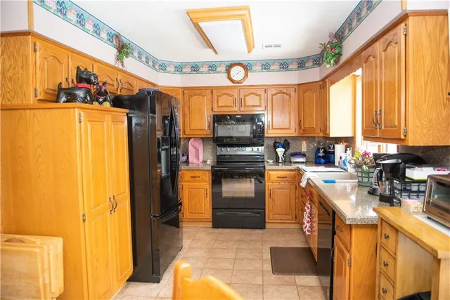 $335,000 | 19001 Sunrise Drive, Belton, MO 64012